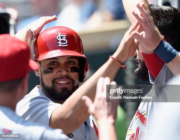 Francisco Pena of the St. Louis Cardinals celebrates scoring a run against the Minnesota Twins during the second inning of the interleague game on...