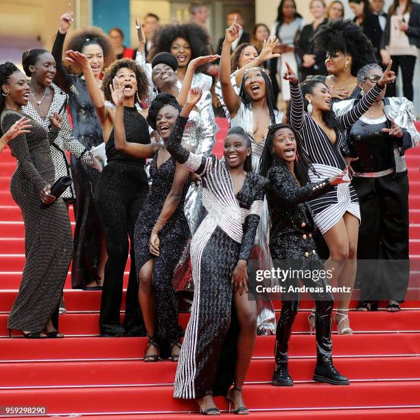 Authors of the book "Noire N'est Pas Mon Métier" pose on the stairs with Jury member Khadja Nin at the screening of "Burning" during the 71st annual...