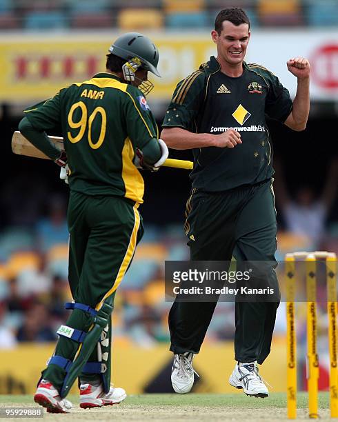 Clint McKay of Australia takes the wicket of Mohammad Aamer of Pakistan during the first One Day International match between Australia and Pakistan...