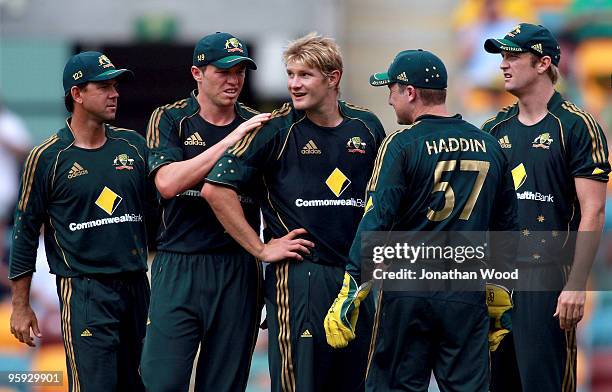 Shane Watson of Australia celebrates after taking a wicket during the first One Day International match between Australia and Pakistan at The Gabba...