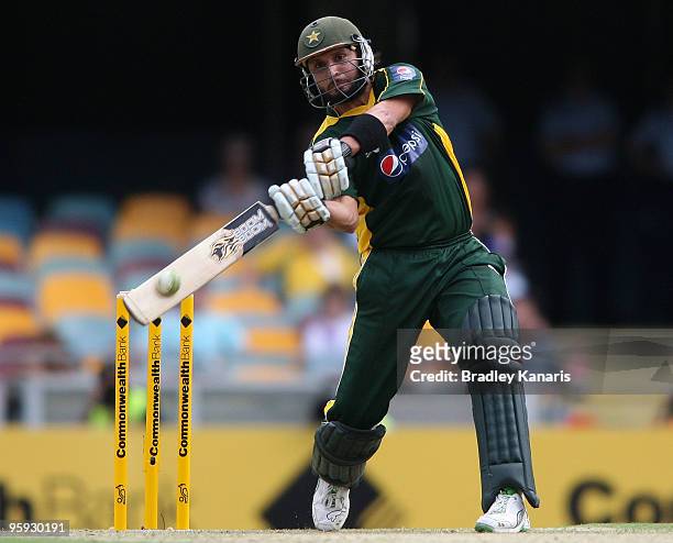 Shahid Afridi of Pakistan hits the ball over the boundary for a six during the first One Day International match between Australia and Pakistan at...