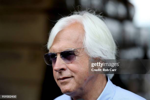 Trainer Bob Baffert talks to media about his horse, Kentucky Derby winner Justify, after the colt arrived at Pimlico Race Course for the upcoming...
