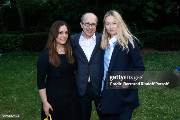 Of "First Heritage Brands" Jean-Marc Loubier standing between his wife Hedieh and Artistic Director at Sonia Rykiel, Julie de Libran attend "Un Monde...