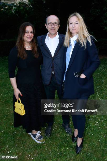 Of "First Heritage Brands" Jean-Marc Loubier standing between his wife Hedieh and Artistic Director at Sonia Rykiel, Julie de Libran attend "Un Monde...