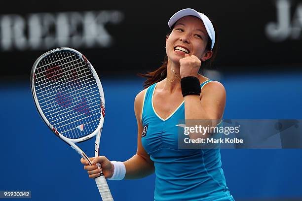 Jie Zheng of China celebrates winning her third round match against Marion Bartoli of France during day five of the 2010 Australian Open at Melbourne...