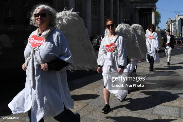 Activists from the 'Angels for Yes' campaign near Trinity College, urging a 'yes' vote in the referendum to repeal the eighth amendment of the Irish...