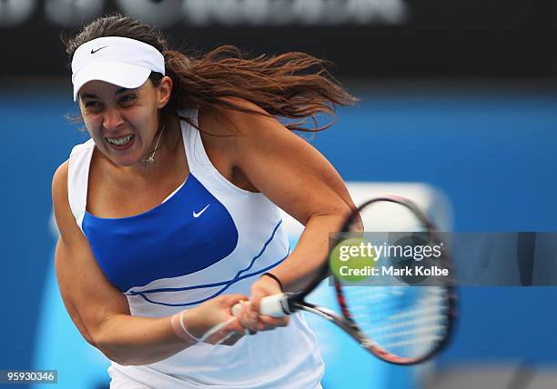 Marion Bartoli of France plays a backhand in her third round match against Jie Zheng of China during day five of the 2010 Australian Open at...