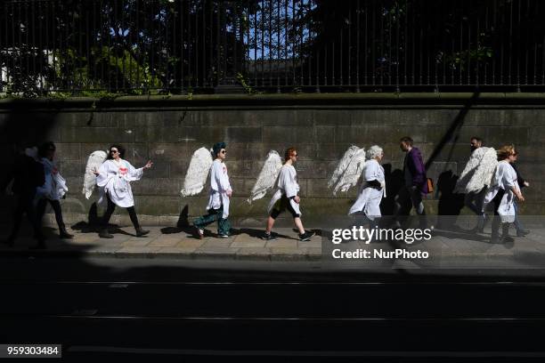 Activists from the 'Angels for Yes' campaign near Trinity College, urging a 'yes' vote in the referendum to repeal the eighth amendment of the Irish...