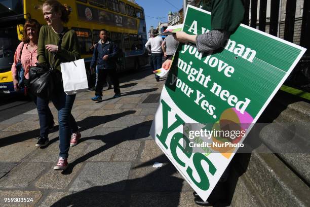 Activists from the 'Trinity Together for Yes' campaign canvass in front of the main entrance to Trinity College, urging a 'yes' vote in the...