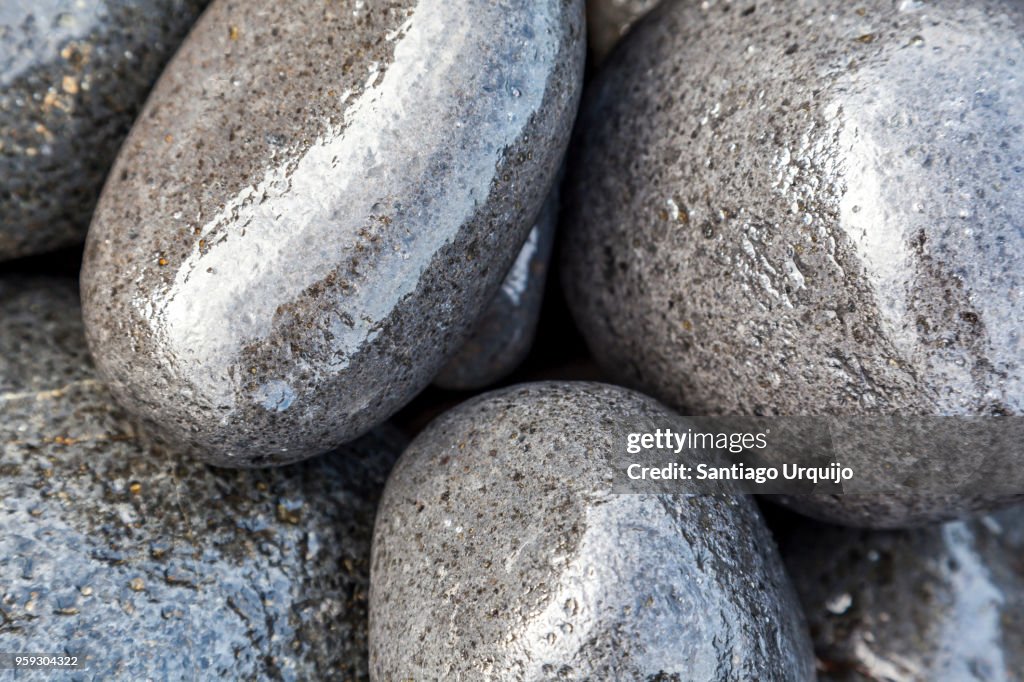 Basalt Rounded Rocks Closeup Of Wet Rounded Basalt Boulders High-Res Stock Photo - Getty Images