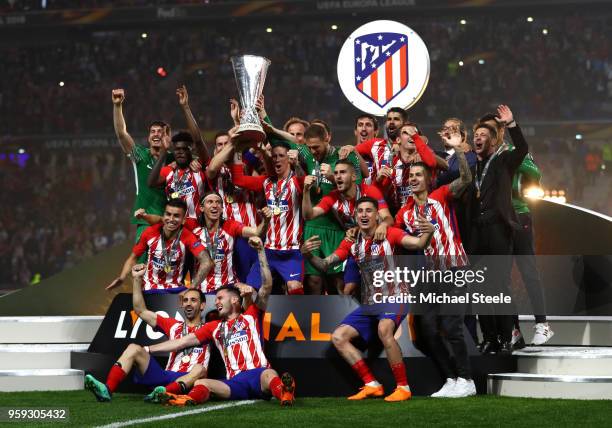 Atletico Madrid players celebrate as they lift The Europa League trophy after the UEFA Europa League Final between Olympique de Marseille and Club...