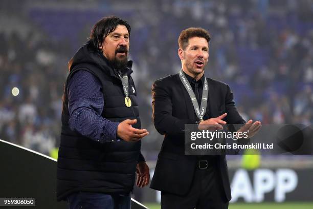 Club Atletico de Madrid manager Diego Simeone and Club Atletico de Madrid assistant manager German Burgos after the UEFA Europa League Final between...