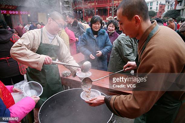 Free Laba porridge is handed out on January 22, 2010 in Nanjing, Jiangsu province of China. The traditional Laba Festival falls on the 8th day of the...