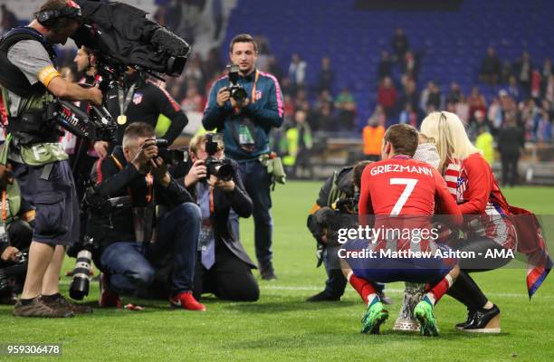 Antoine Griezmann of Atletico Madrid celebrates with wife Erika and daughter Mia at the end of the UEFA Europa League Final between Olympique de...