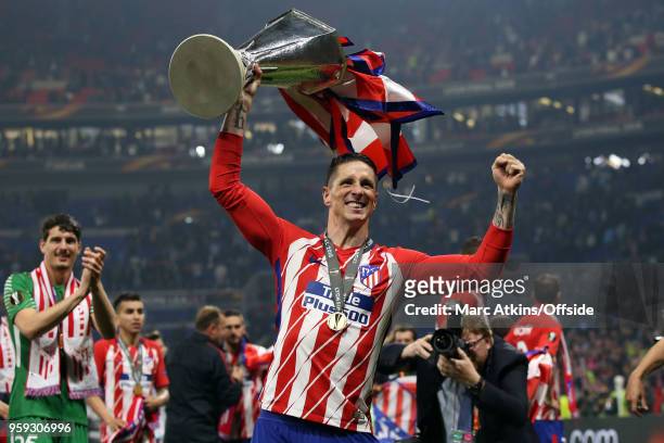 Fernando Torres of Atletico Madrid celebrates with the trophy during the UEFA Europa League Final between Olympique de Marseille and Club Atletico de...