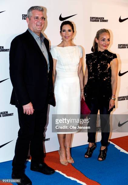 May 16: Crown Princess Mary of Denmark poses with Eva Kruse, CEO and President for The Global Fashion Summit, and Eric Sprunk, COO at NIKE Inc. At...