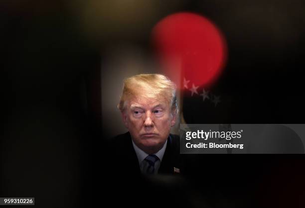 President Donald Trump listens during a meeting with California leaders and public officials in the Cabinet Room of the White House in Washington,...