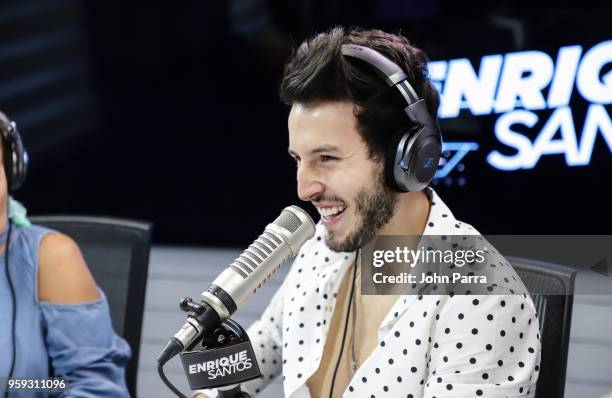 Sebastian Yatra visits "The Enrique Santos Show" at I Heart Latino Studios on May 16, 2018 in Miramar, Florida.