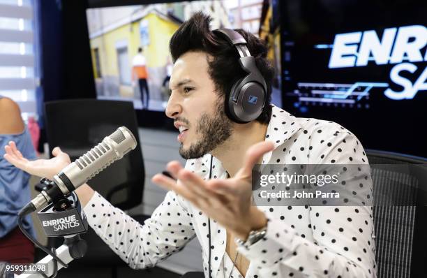 Sebastian Yatra visits "The Enrique Santos Show" at I Heart Latino Studios on May 16, 2018 in Miramar, Florida.