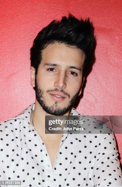 Sebastian Yatra visits "The Enrique Santos Show" at I Heart Latino Studios on May 16, 2018 in Miramar, Florida.