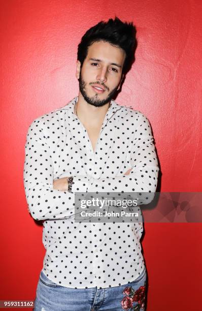 Sebastian Yatra visits "The Enrique Santos Show" at I Heart Latino Studios on May 16, 2018 in Miramar, Florida.