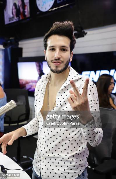 Sebastian Yatra visits "The Enrique Santos Show" at I Heart Latino Studios on May 16, 2018 in Miramar, Florida.