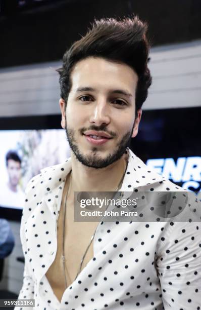 Sebastian Yatra visits "The Enrique Santos Show" at I Heart Latino Studios on May 16, 2018 in Miramar, Florida.