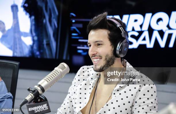 Sebastian Yatra visits "The Enrique Santos Show" at I Heart Latino Studios on May 16, 2018 in Miramar, Florida.