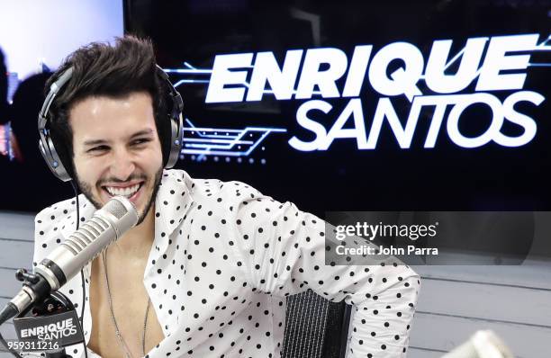 Sebastian Yatra visits "The Enrique Santos Show" at I Heart Latino Studios on May 16, 2018 in Miramar, Florida.