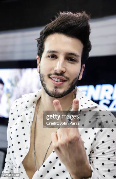 Sebastian Yatra visits "The Enrique Santos Show" at I Heart Latino Studios on May 16, 2018 in Miramar, Florida.