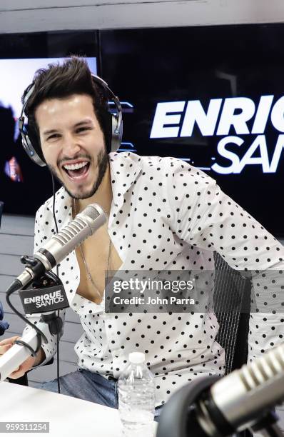 Sebastian Yatra visits "The Enrique Santos Show" at I Heart Latino Studios on May 16, 2018 in Miramar, Florida.