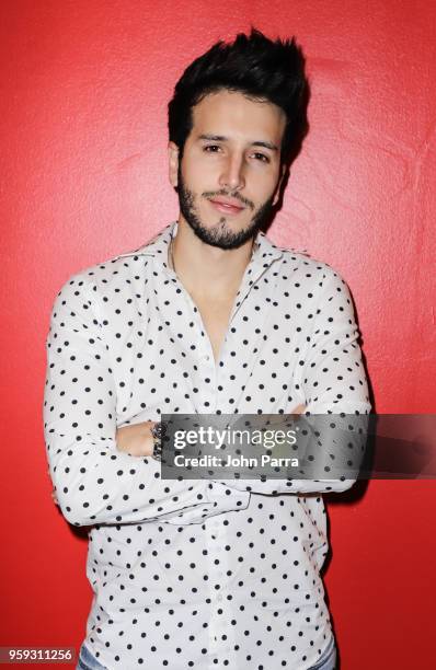 Sebastian Yatra visits "The Enrique Santos Show" at I Heart Latino Studios on May 16, 2018 in Miramar, Florida.