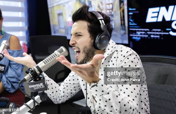 Sebastian Yatra visits "The Enrique Santos Show" at I Heart Latino Studios on May 16, 2018 in Miramar, Florida.