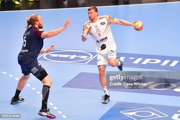 Sergiy Onufriyenko of Aix and Henrik Mollgaard Jensen of PSG during the Lidl StarLigue match between Paris Saint Germain and Aix at Salle Pierre...