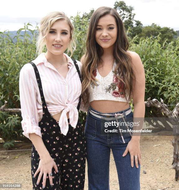 Madison Marlow and Taylor Dye of Maddie & Tae pose at Regusci Winery during Live In The Vineyard Goes Country on May 16, 2018 in Napa, California.