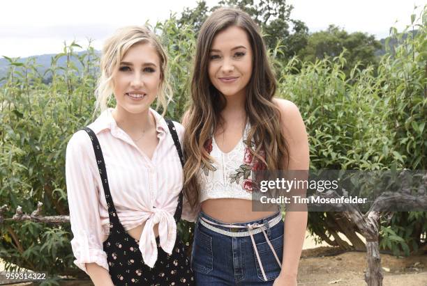 Madison Marlow and Taylor Dye of Maddie & Tae pose at Regusci Winery during Live In The Vineyard Goes Country on May 16, 2018 in Napa, California.