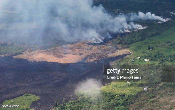 Eruptive activity continues from an alignment of fissure vents from the Kilauea volcano in the vicinity of fissure 17, as a lava flow cools on...