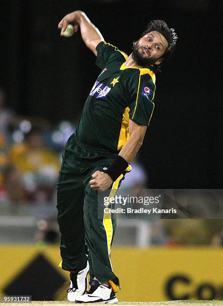 Shahid Afridi of Pakistan bowls during the first One Day International match between Australia and Pakistan at The Gabba on January 22, 2010 in...