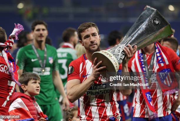 Gabi of Athletico Madrid holds the trophy during the UEFA Europa League Final between Olympique de Marseille and Club Atletico de Madrid at Stade de...