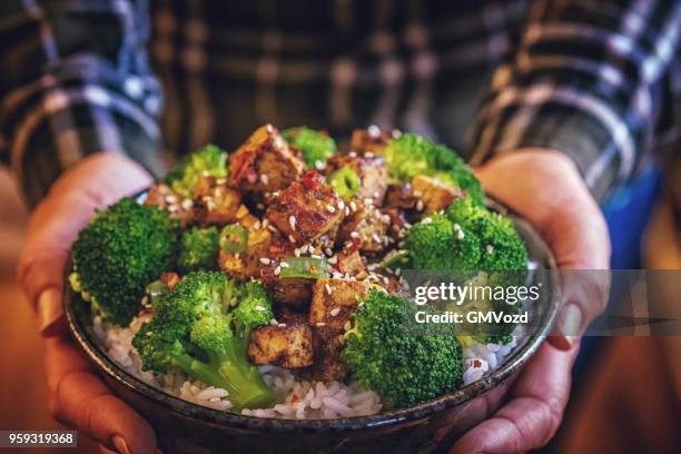 roasted tofu with soy sauce, broccoli and rice - sesame oil stock pictures, royalty-free photos & images