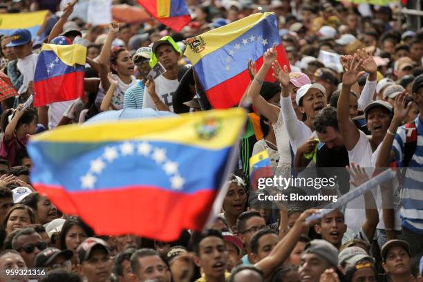 Attendees wave flags and cheer during the closing campaign rally for Evangelical pastor Javier Bertucci, presidential candidate for the Esperanza Por...