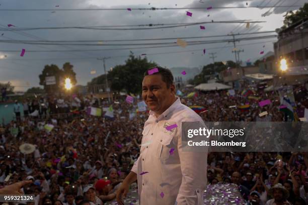 Evangelical pastor Javier Bertucci, presidential candidate for the Esperanza Por El Cambio Party, reacts after speaking during his closing campaign...
