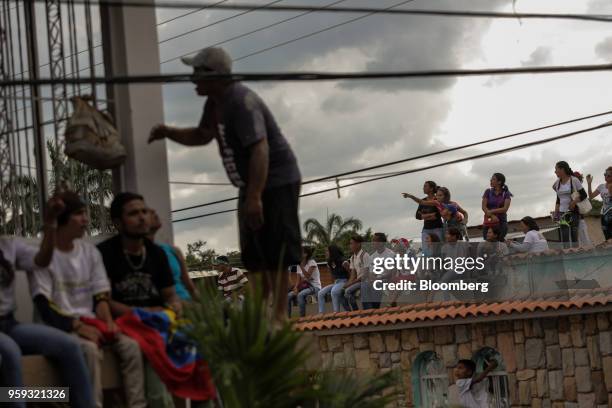 Attendees listen during the closing campaign rally for Evangelical pastor Javier Bertucci, presidential candidate for the Esperanza Por El Cambio...