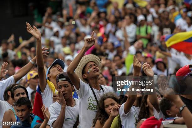 Attendees cheer during the closing campaign rally for Evangelical pastor Javier Bertucci, presidential candidate for the Esperanza Por El Cambio...