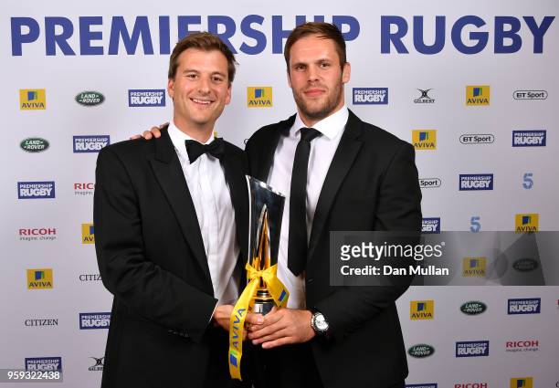 Will Welch of Newcastle Falcons receives the Aviva Premiership Rugby Player of the Season award on behalf of Vereniki Goneva from Tom Daniell of...