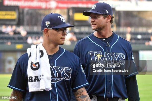 Tampa Bay Rays starting pitcher Anthony Banda with Tampa Bay pitching coach Kyle Snyder before a Major League Baseball game between the Tampa Bay...