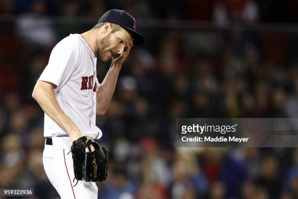 Chris Sale of the Boston Red Sox reacts after Marcus Semien of the Oakland Athletics hit a two run home run during the fifth inning at Fenway Park on...