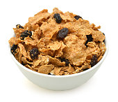 bran and raisin cereal in a bowl , top view