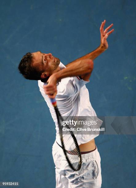 Ivo Karlovic of Croatia serves in his third round match against Ivan Ljubicic of Croatia during day five of the 2010 Australian Open at Melbourne...