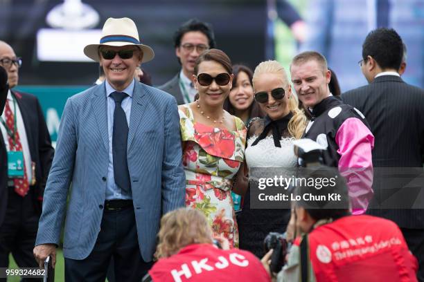 Trainer John Moore and his wife FiFi , Jockey Zac Purton and his wife Nicole Purton celebrate after Beauty Generation winning Race 6 Champions Mile...